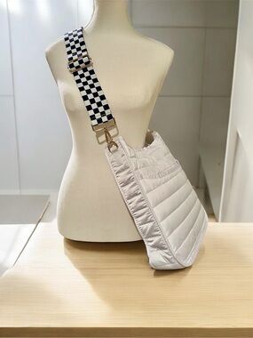 Ah Dorned White Quilted Crossbody Bag with Dark Navy Checkerboard Strap!